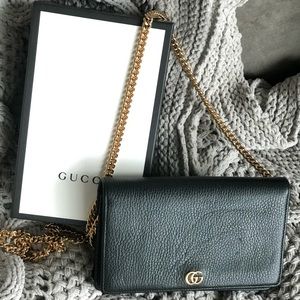 Gucci all black wallet on a chain
